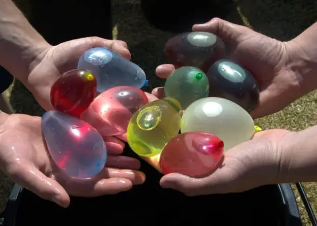 Water balloons on a hot day is one of the most fun ways to keep kids busy. And they'll definitely remember it for years.