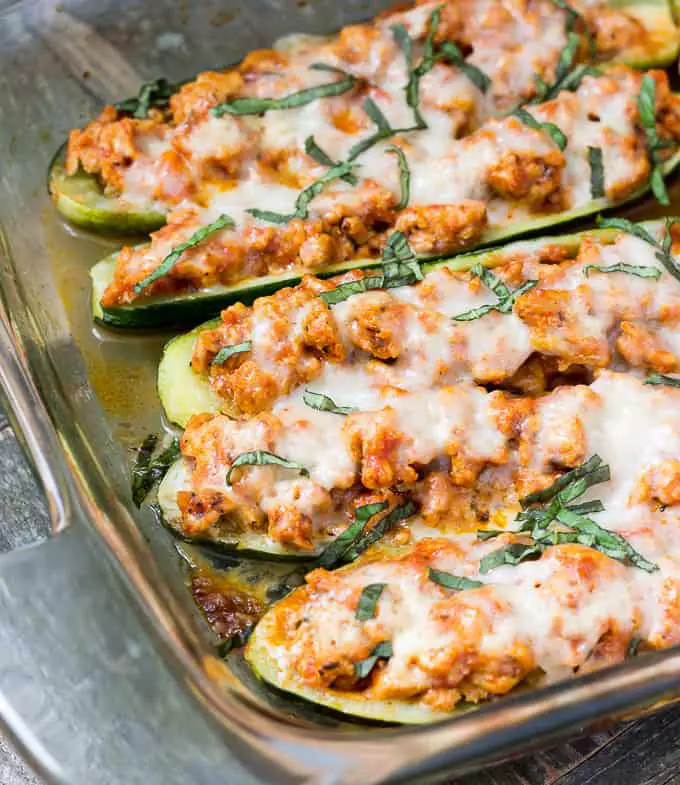 Low calorie high protein Chicken-Parmesan Zucchini Boats are a nice change of pace.