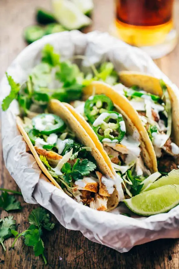 These Ancho Chicken Tacos are a great combination of fresh flavors, and they taste like a treat even though they're high in protein and surprisingly low in calories.