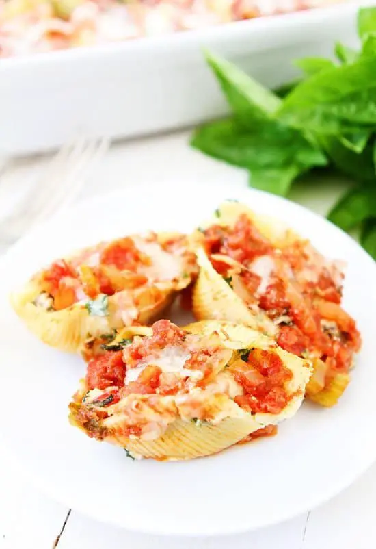 Roasted vegetable stuffed shells is a great freezer meal to have on hand. It's really flavorful, easy to prep, and is free of all the store bought preservatives.