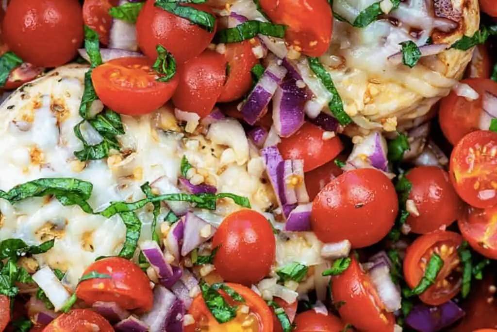 Bruschetta chicken is more flavorful than chicken parmesan, and a lot less carbs.